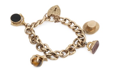 A 9ct gold curb link charm bracelet, with engraved padlock...