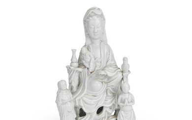 A BLANC-DE-CHINE 'GUANYIN AND CHILD' GROUP 19th century