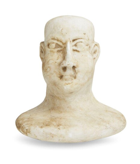 A Bactrian marble head from a composite figure, circa late 3rd - early 2nd Millenium B.C., 8.6cm. high Provenance: Private family collection formed in the 1970s and gifted to the present owner in 2004