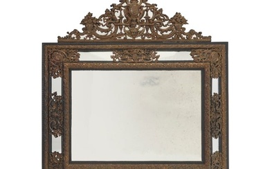 A Baroque-style brass and wood cushion mirror