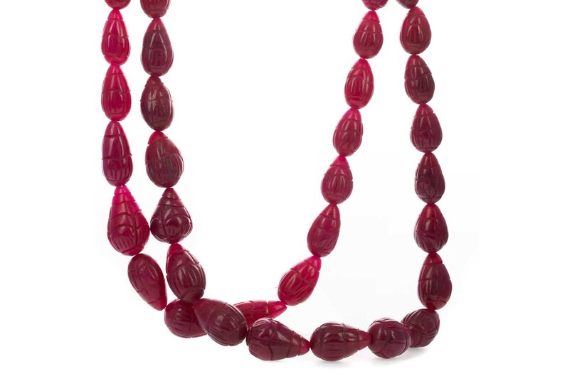 A CARVED BEAD RUBY NECKLACE