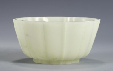 A CARVED WHITE JADE LOBED BOWL