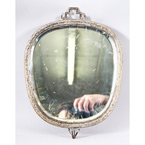 A CHINESE WHITE METAL CARVED WALL MIRROR - the mirror encaps...