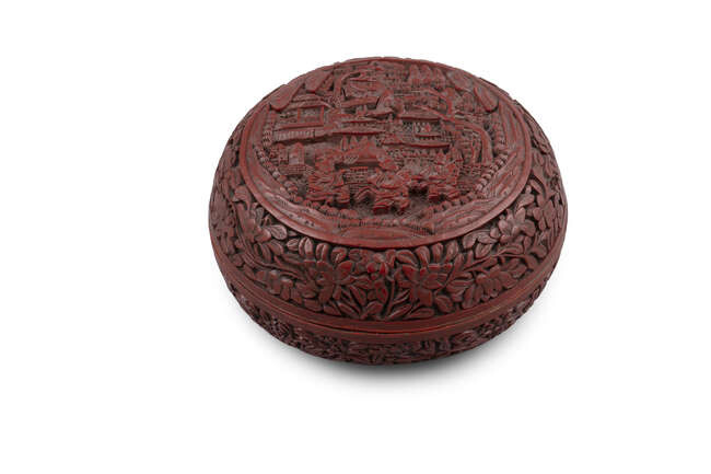 A CINNABAR LACQUER 'BOYS' ROUND BOX AND COVER...