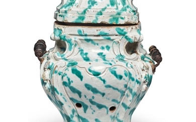 A CONTINENTAL FAIENCE PORTABLE STOVE AND COVER, LATE 18TH/19TH CENTURY