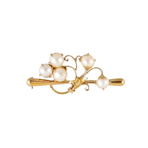 A CULTURED PEARL SET BROOCH, of naturalistic form, mounted i...