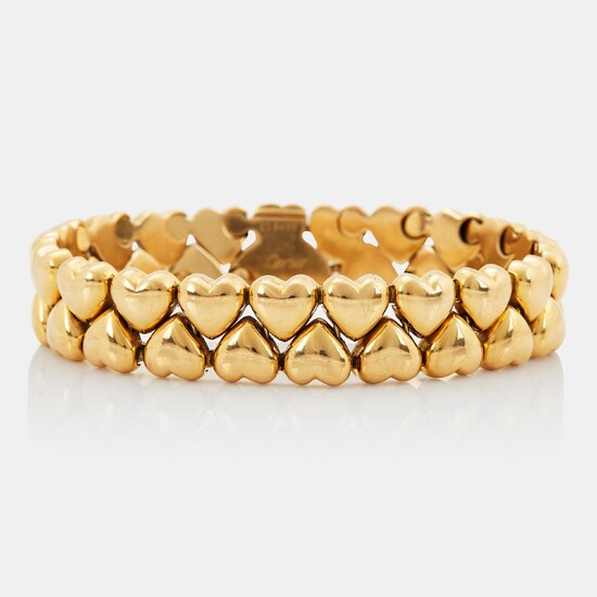 A Cartier 18K gold "Double Hearts" bracelet