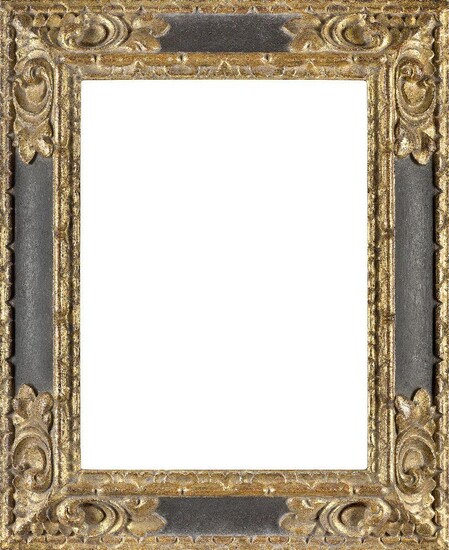 A Carved Parcel Gilded and Ebonised Spanish Style Frame, late 20th century, ( VAT charged on hammer price) with leaf ogee sight, bar torus front edge, the reverse scotia frieze with scrolling leaf corners and schematic foliate back edge, 47.5 x 35...