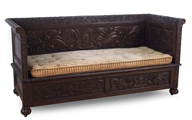 A Carved Wood Daybed.