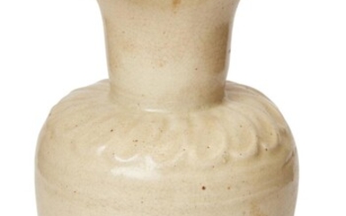 A Chinese Cizhou-type vase, Song dynasty, of slightly compressed globular form with a short foot rising to a thick neck and everted foliate rim, a band of moulded petal decoration to the shoulder, of creamy glaze with fine crackles throughout, base...