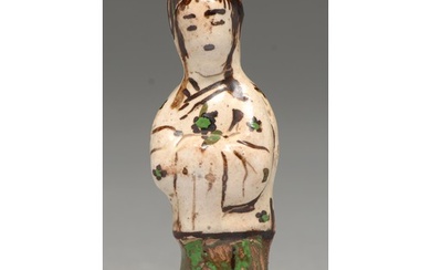 A Chinese Cizhou ware miniature figure of a woman, Song dyna...