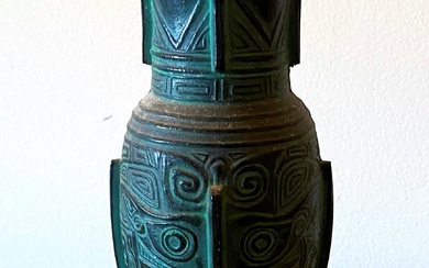 A Chinese Copper Alloy Sanxingdui Style Vase Depicting Archaistic Motifs