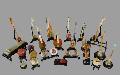 A Chinese Set of 24 Agate & Hardstone Carved Miniature Instrument Figure Set