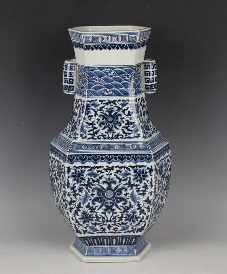 A Chinese blue and white porcelain vase, mark of Qianlong but 20th century or later, of hexagonal hu