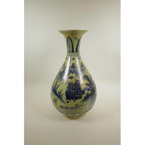 A Chinese blue and white pottery pear shaped vase decorated ...