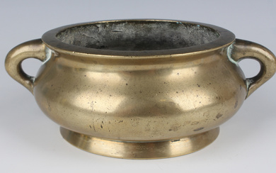 A Chinese bronze bombé censer, mark of Xuande but probably 18th century, the low-bellied circul