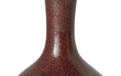 A Chinese iron-rust-glazed miniature bottle vase, 18th century, the vase of compressed globular form raised on a short waisted foot, the exterior, interior and base covered in a silver speckled reddish-brown glaze, 10cm high 十八世紀 鐵鏽花釉瓶