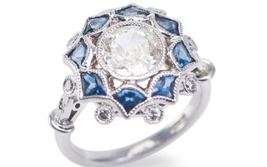 A DIAMOND AND SAPPHIRE RING