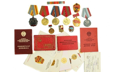 A DOCUMENTED GROUP OF RUSSIAN MEDAL ORDER BADGES