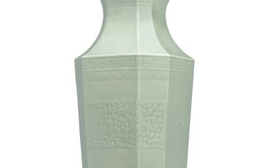 A FINE AND RARE MOULDED CELADON-GLAZED ‘DRAGON AND PHOENIX’ OCTAGONAL...