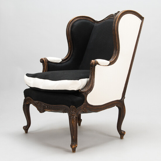A French, first half of the 20th century Louis XVI style bergère armchair.