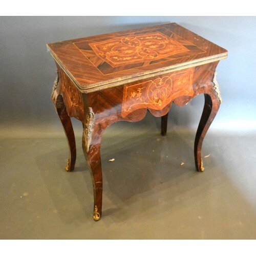 A French inlaid and gilt metal mounted card table, the hinge...