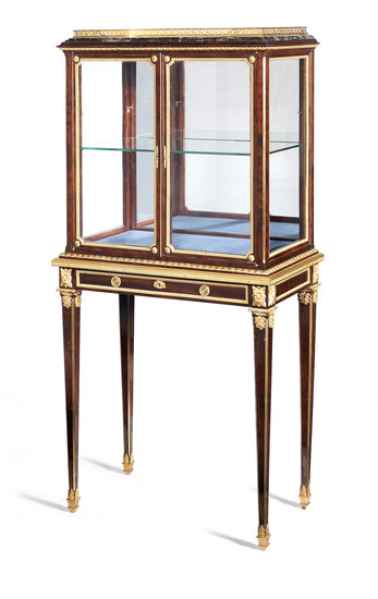 A French late 19th century mahogany and gilt metal mounted vitrine