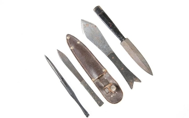 A GROUP OF FOUR THROWING KNIVES, including three World