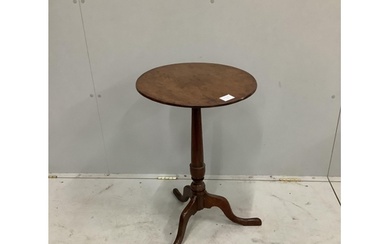 A George III circular oak tripod wine table, diameter 43cm, ...