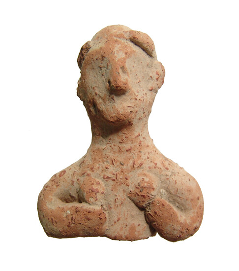 A Greek terracotta bust of a woman