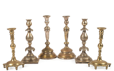 A Group of Continental Brass and Silverplated Candlesticks