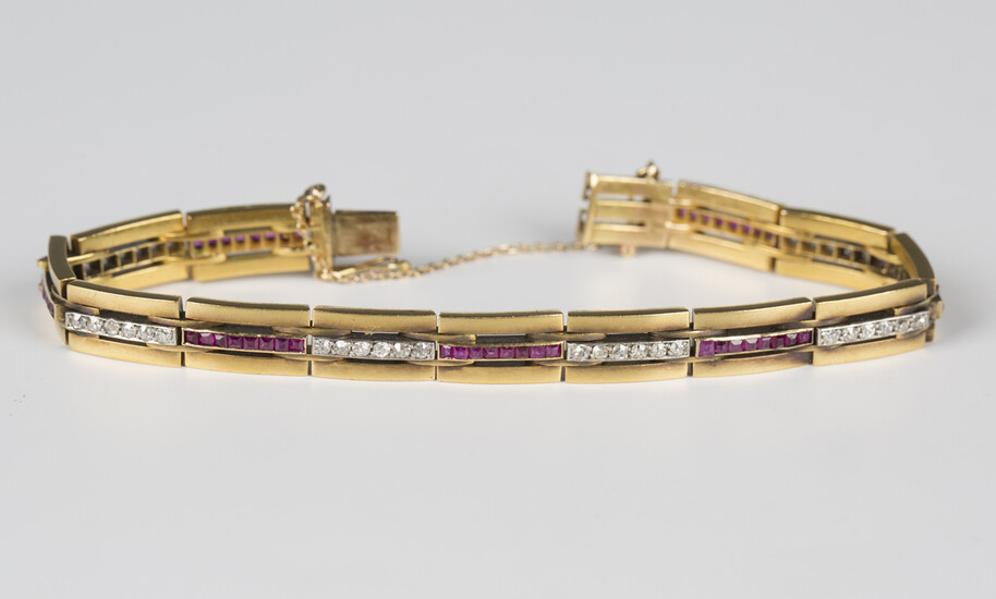A Hungarian gold, ruby and diamond bracelet, mid-20th century, in a rectangular triple bar link desi