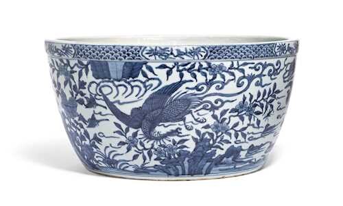 A LARGE BLUE AND WHITE FISH BOWL.