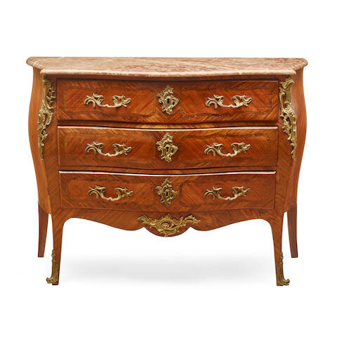 A LOUIS XV STYLE MARBLE TOP GILT BRONZE MOUNTED INLAID KINGWOOD, MAHOGANY, AND WALNUT COMMODE