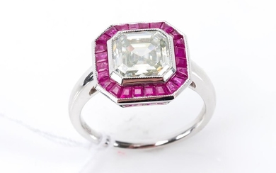 A MOISSANITE AND RUBY RING IN 18CT WHITE GOLD
