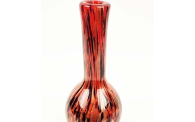 A MURANO STYLE GLASS VASE, of bottle form, red ground with b...