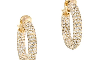A PAIR OF DIAMOND HOOP EARRINGS each designed as a hoop pave set with round brilliant cut diamond...