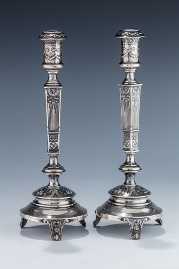 A PAIR OF SILVER CANDLESTICKS BY M. ROZENBLAT. Warsaw,...