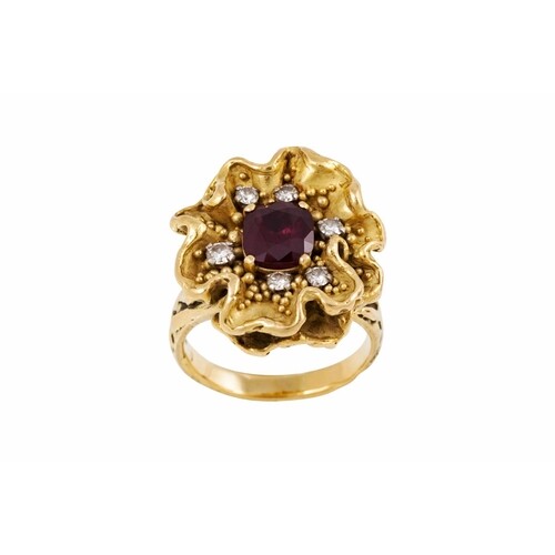 A RUBY AND DIAMOND DRESS RING, modelled as a poppy, mounted ...