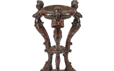 A Renaissance Revival style carved oak plant stand with fifteen rock crystal orbs