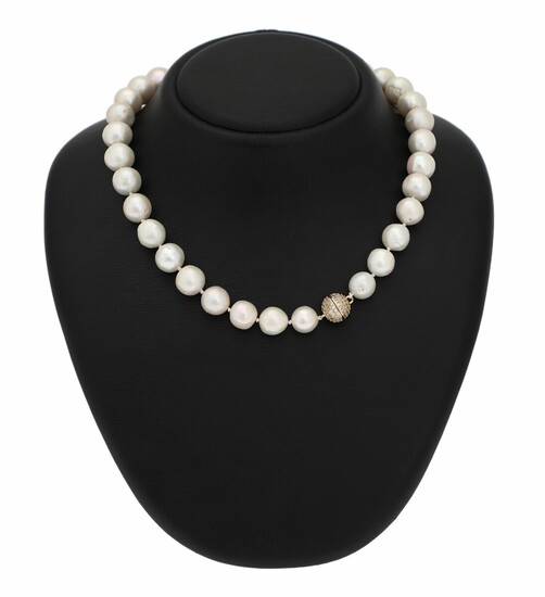 NOT SOLD. A South Sea pearl necklace set with numerous cultured South Sea pearls and...