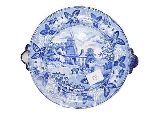 A Staffordshire Pearlware Hot Water Plate, circa 1830, with cow's...