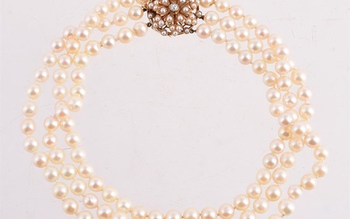 A THREE ROW CULTURED PEARL NECKLACE WITH A DIAMOND AND HALF CULTURED PEARL CLASP, LONDON 1988