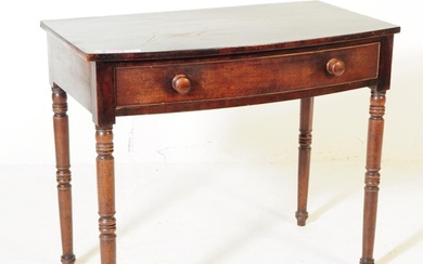 A Victorian 19th century mahogany bow front writing table de...