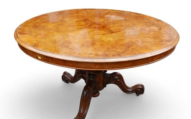 A Victorian Burr walnut breakfast table, with tilt top and r...