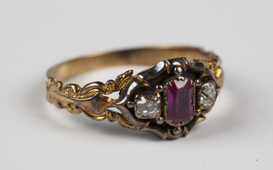 A Victorian gold and silver set, ruby and diamond three stone ring, circa 1850, mounted with the cus