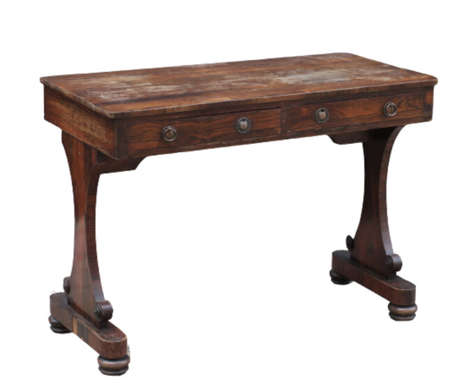 A Victorian rosewood pedestal writing table. The rectangular top...