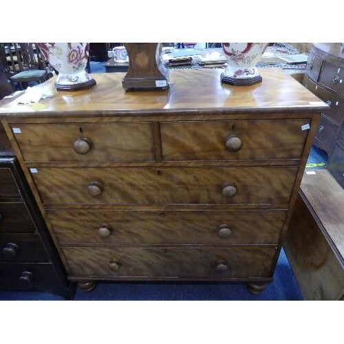 A Victorian satinwood Chest of Drawers, with two short drawe...