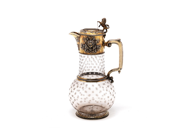 A Victorian silver-gilt-mounted claret jug