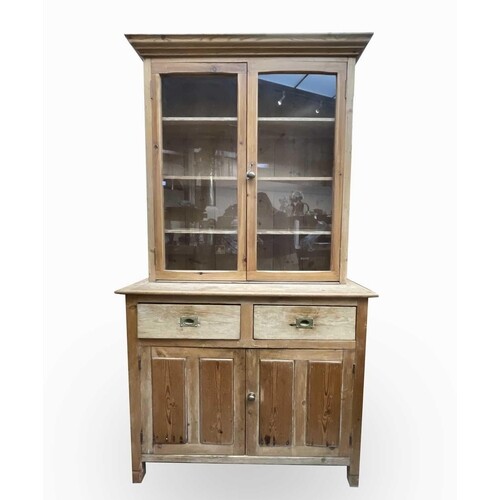 A Victorian stripped pine kitchen dresser, the moulded corni...